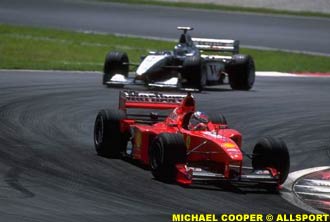 Schumacher ahead of Hakkinen at Malaysia last year