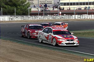 Gabriele Tarquini leads in his Honda Accord