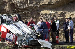 Makinen's Lancer on its roof