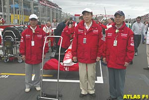 Happy Toyota execs on the grid