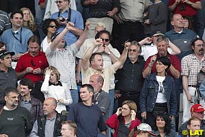 The crowd at the A1-Ring jeers Ferrari