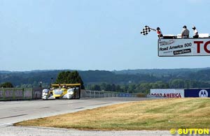 Capello receives the chequered flag