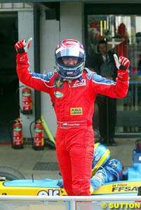 Tomas Enge celebrates in parc ferme