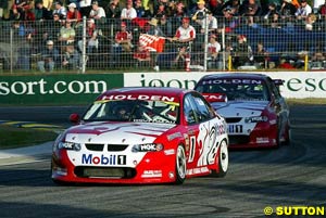 Mark Skaife leads Jason Bright in race one