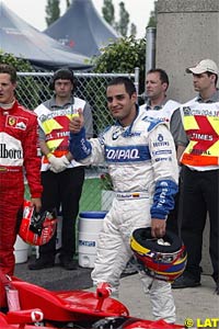 Juan Pablo Montoya celebrates pole