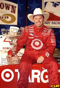 A happy Jeff Ward with his winner's hat and trophy