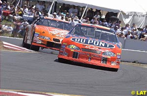 Early leader Jeff Gordon leads Tony Stewart