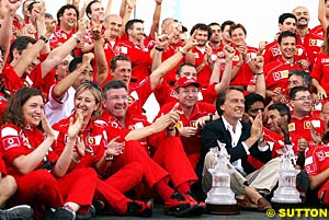 The Ferrari team celebrate