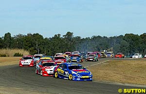 The start of race one, Marcos Ambrose leading the pack