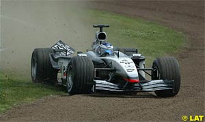 Raikkonen goes off after losing his rear wing