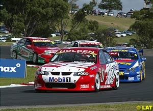 Mark Skaife under pressure from Marcos Ambrose