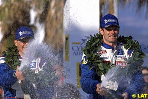 Navigator Timo Rautiainen and his driver Marcus Gronholm celebrate their Cyprus victory