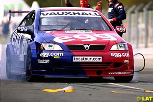 Paul O'Neill smoke the tyres as he leaves the pits after his pit stop