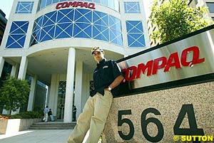 Montoya at the gates of Compaq's Australian building