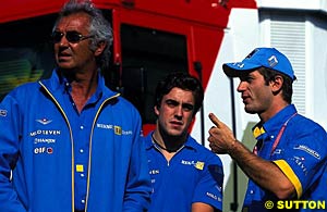 Flavio Briatore with Renault's 2003 drivers Fernando Alonso and Jarno Trulli