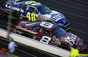 Dale Earnhardt Jr battles with Jimmie Johnson earlier in the race